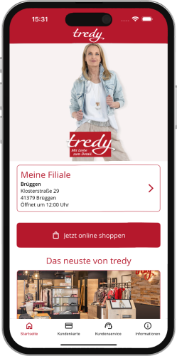 iPhone das die Startseite der neuen tredy Fashion App zeigt, in der Navigationsleiste das tredy Logo, darunter ein Bild einer Frau mit dem tredy Logo, darunter Informationen zur Filiale Brüggen, darunter ein Button mit einem Warenkorb Symbol und der Beschriftung "Jetzt online shoppen" und eine Überschrift "Das neuste von tredy"